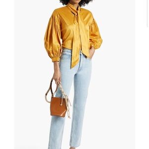 ULLA JOHNSON
Daphne high-rise slim-leg jeans